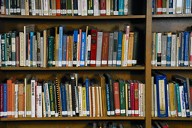 Image of multi-coloured books in a library