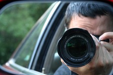 Image of photographer focusing on subject