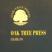 Image of the Oak Tree Press logo on a management book